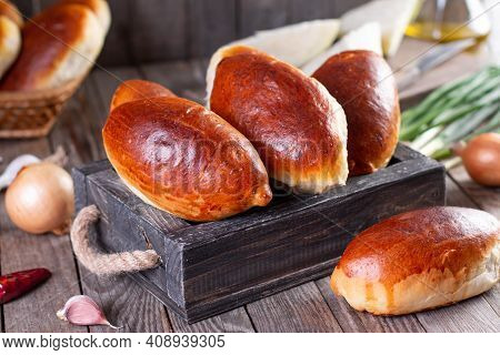 Russian Pastries (pirogi) Filled With Eggs And Green Onion