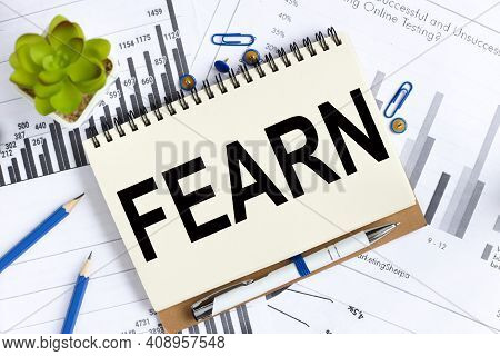 Fearn. Text On White Notepad Paper On Light Background