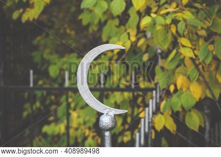 Old Islamic Cemetery, Funeral And Burial Of Muslim. A Grave With Iron Crescent Moon. Metal Graveston
