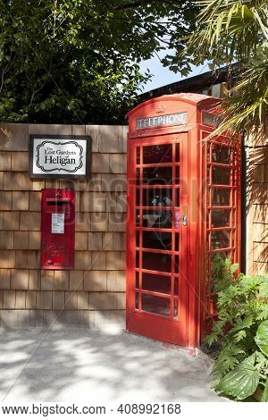 Saint Austell (england), Uk - August 19, 2015: A Red Phone Box In The Lost Gardens Of Heligan, Cornw