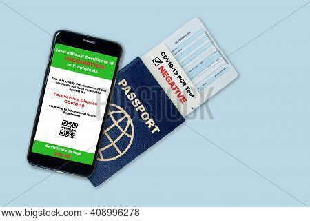 Smartphone On Travel Passport, Boarding Pass With Digital Certificate Of Covid-19 Vaccination And Pr