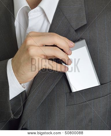 Executive saving or taking your phone in the jacket