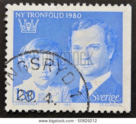 a stamp printed in the Sweden shows King Carl XVI Gustaf and Crown Princess Victoria