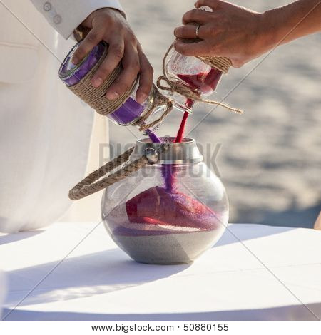 detail of sand ceremony being performed at wedding