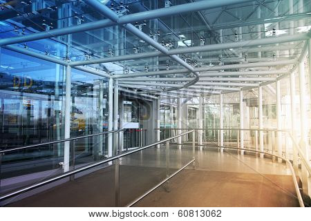 LONDON, UK - MARCH 23, 2014: Stansted airport glass tunnel, details of contemporary airport interior