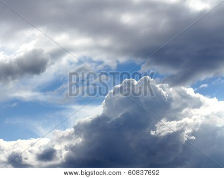 Clear Mountain Sky Blue With Clouds Laden With Rain And Snow