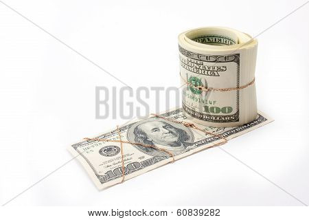 Money And Roll Of Money Entwisted By Gold