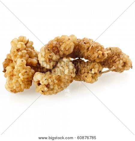 dried mullberry berries heap isolated on white background 