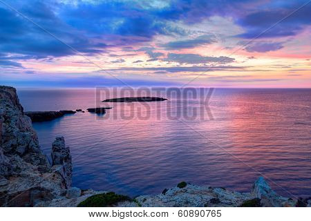 Menorca sunset in Cap de Caballeria cape at Balearic Islands es Mercadal