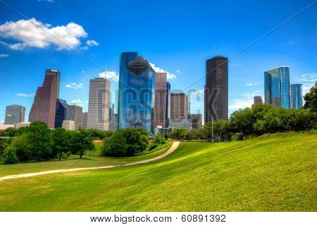 Houston Texas Skyline with modern skyscrapers and blue sky view from park lawn