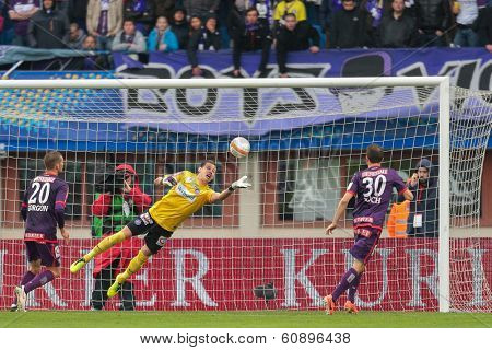 VIENNA,  AUSTRIA - MAY 30 Heinz Lindner (#13 Austria) deflects the ball during the Austrian cup final game on May 30, 2013 in Vienna, Austria.