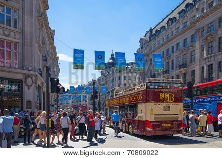 LONDON, UK - JULY 29, 2014: Regent street in London, tourists and busses