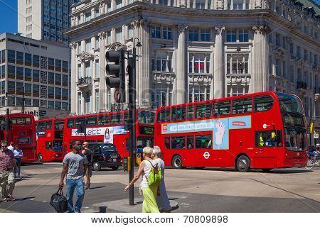 LONDON, UK - JULY 29, 2014: Regent street in London, tourists and busses