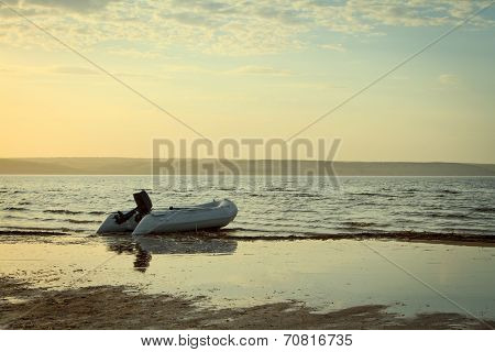Boat On The River In Sunset Time