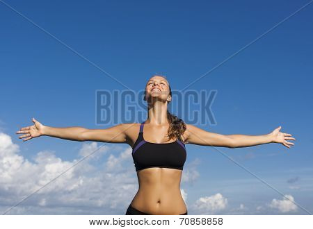 Beautiful Girl With Arms Outstretched