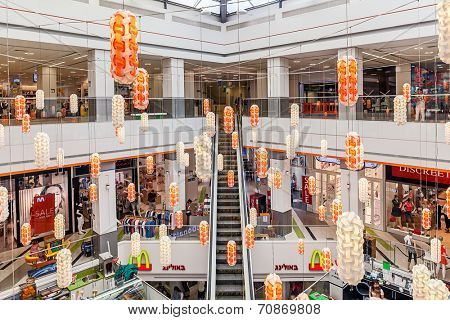 ASHKELON, ISRAEL - JULY 16, 2014: Interior view of Hutzot shopping mall - owned by Aspen Group, offers variety of services like entertainment venues, brand shops, bars, restaurants and movie theater.