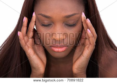 Woman Suffering From Headache At Home