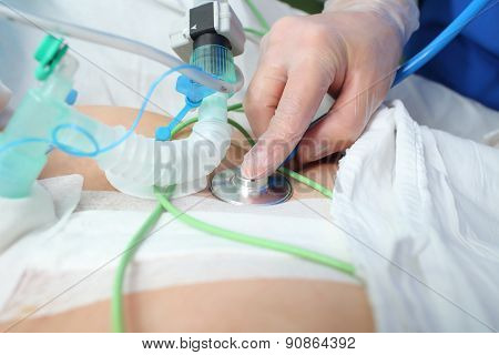 Doctor Listens Heart With A Stethoscope