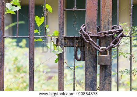 Padlock Lasso With Rusty Chain In The Old House.