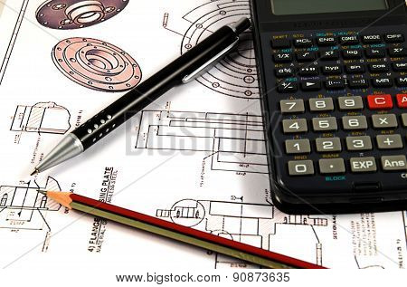 Scientific calculator, Pen and Pencil over the Engineering Drawing Map