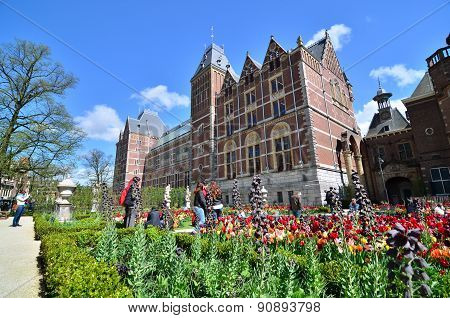 Amsterdam, Netherlands - May 6, 2015: Tourists At The Garden Around The Rijksmuseum