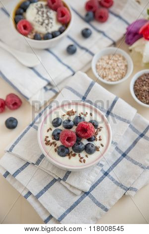 Joghurt with granola and fresh fruit for breakfast