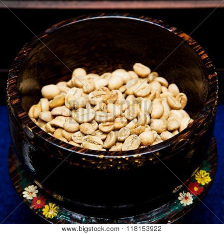Coffee beans from the civet for background.