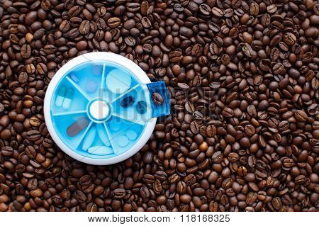 coffee beans in a pillbox