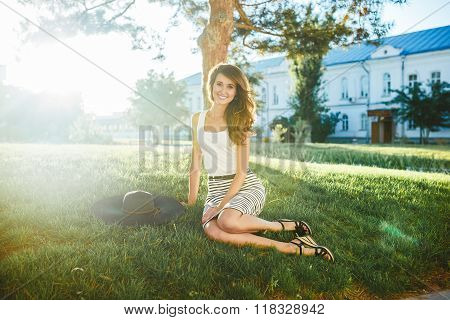 brunette in hat with large fields