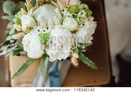 Wedding Bouquet With Peonies Standing On A Window