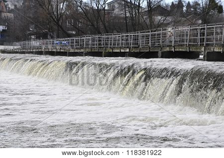 Waterfall on the river. Groyne hydraulic structure of on the river Ros. City of Bila Tserkva.
