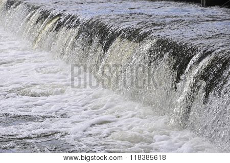 Waterfall on the river. Groyne hydraulic structure of on the river Ros. City of Bila Tserkva. Ukrain