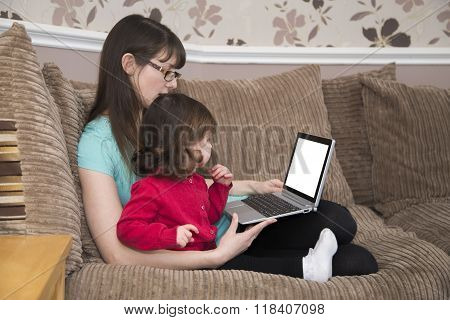 Mother and daughter surfing the world wide web