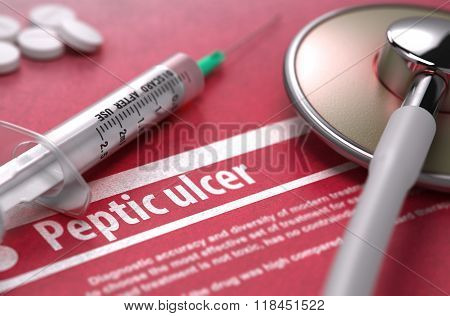 Peptic ulcer - Printed Diagnosis on Red Background.