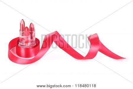 Lipstick With A Ribbon On A White Background