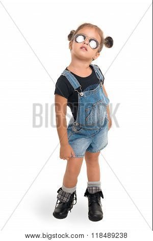 Baby Girl  With Sunglasses Posing  In Studio.isolated