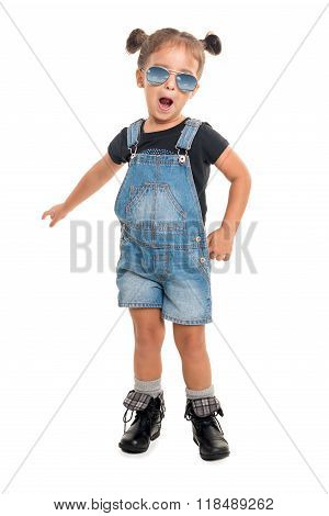Baby Girl  With Sunglasses Posing  In Studio.isolated