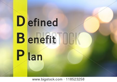 Acronym DBP as Defined Benefit Plan. The blurred lights visible in the background.