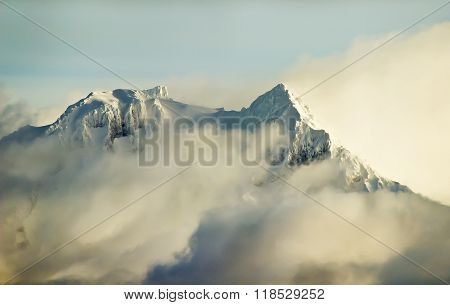 Mountain Peak Covered in Clouds