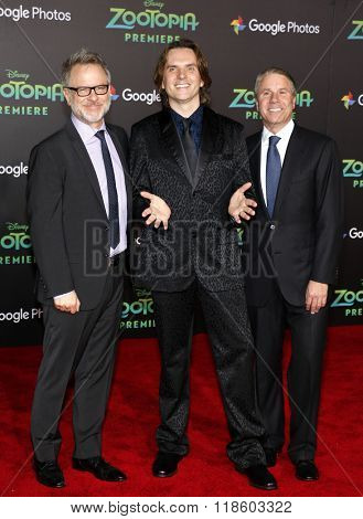 Byron Howard, Rich Moore and Clark Spencer at the Los Angeles premiere of 'Zootopia' held at the El Capitan Theater in Hollywood, USA on February 17, 2016.