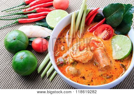 Thai Prawn Soup with Lemongrass (Tom Yum Goong) On Brown Cloth Background.
