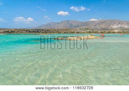 People have a joy at Elafonisi beach. Elafonisi beach is one of the most popular beaches on Crete is
