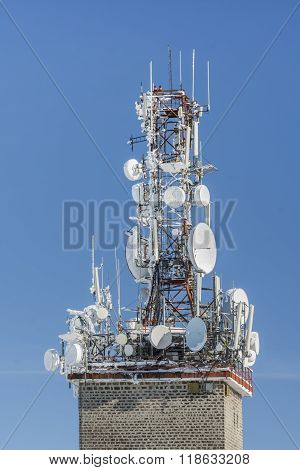 Telecommunication Tower With Dish And Mobile Antennas