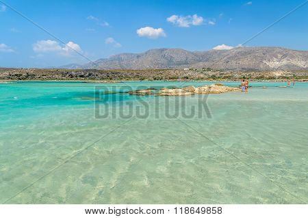 People have a joy at Elafonisi beach. Elafonisi beach is one of the most popular beaches on Crete island