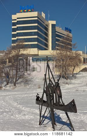 NIZHNY TAGIL, RUSSIA - FEBRUARY 16, 2016: Photo of Sculpture and the hotel 