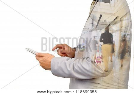 Double Exposure Image Of Businessman Use Digital Tablet And People Walking In Airport Terminal