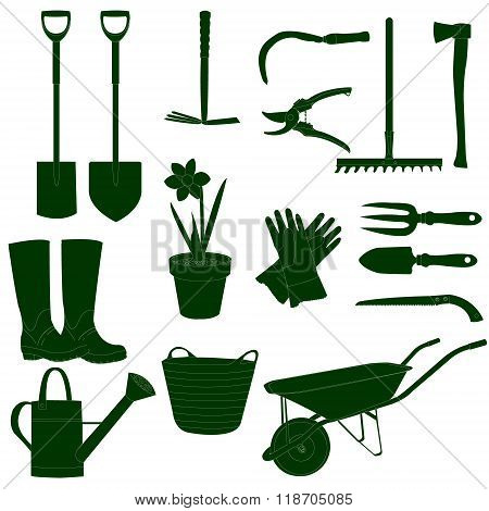 Green garden work tools on white background
