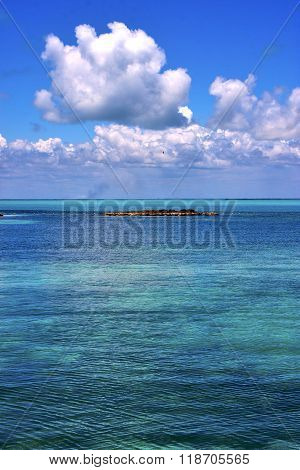 Coastline And Rock In The  Blue