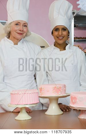 Bakers with cakes