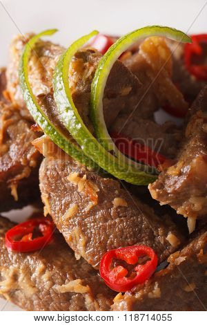 Beef Rendang With Coconut And Spices Macro. Vertical